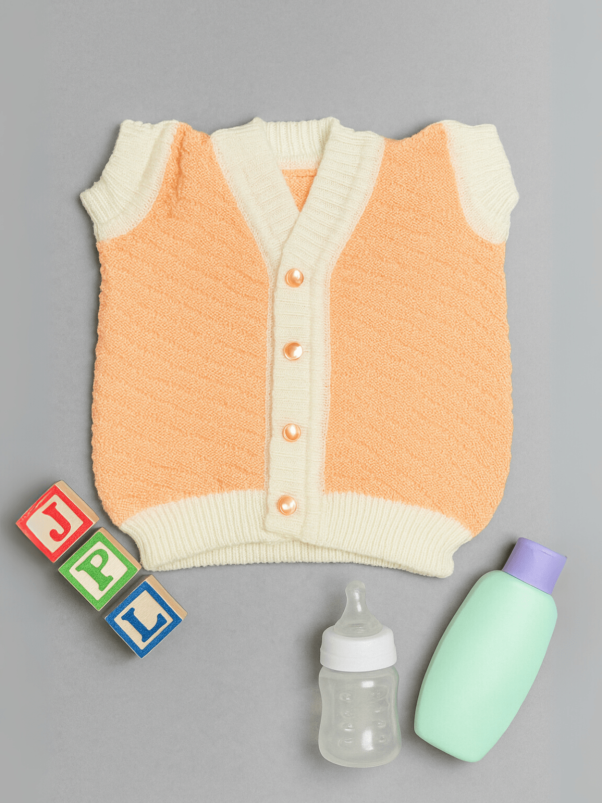 Peach diamond knit woollen sleeveless vest for baby 3-6 months by Little Angels